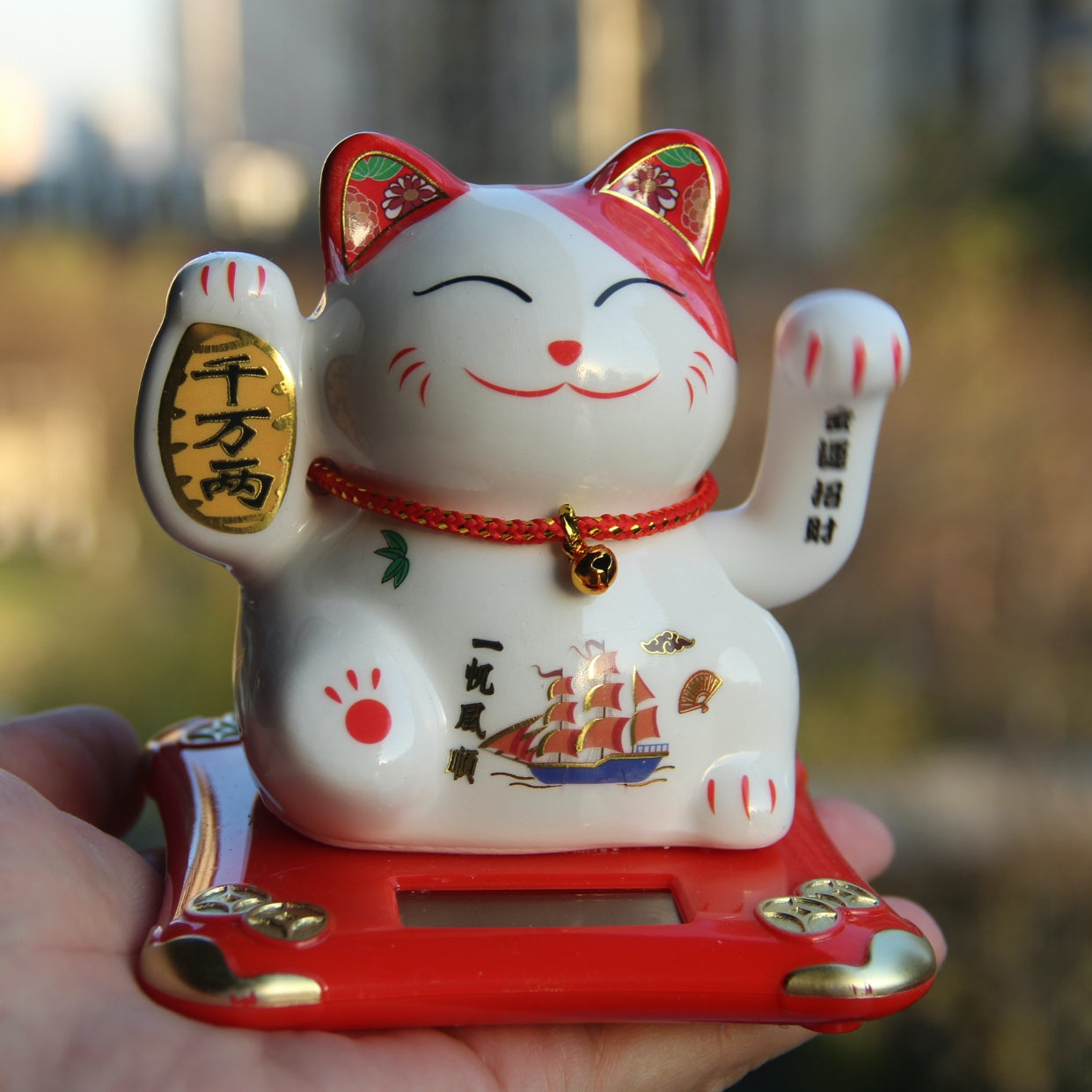 Solar energy auto waving hand Maneki Neko Lucky cat porcelain ceramic.